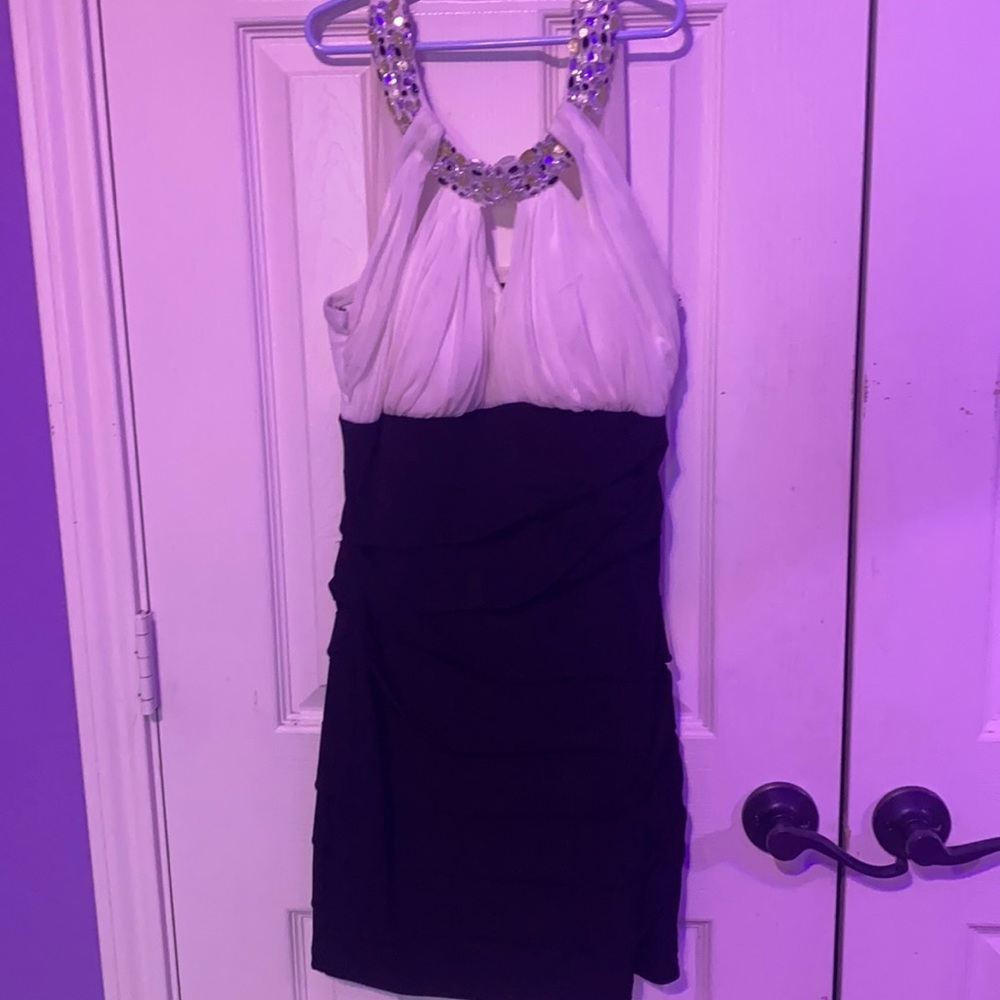 Body con dress with jeweled accent around the neck